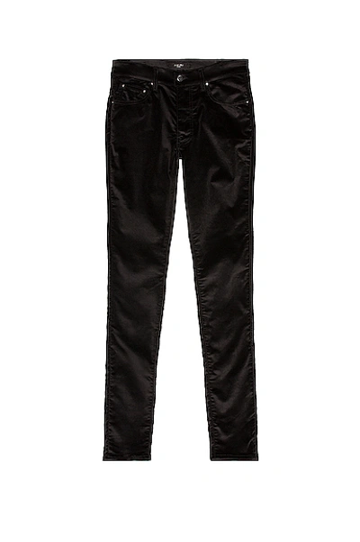 Shop Amiri Skinny Stack Velvet Pant In Black