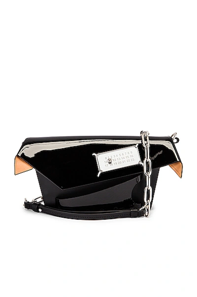 Shop Maison Margiela Snatched Clutch In Black