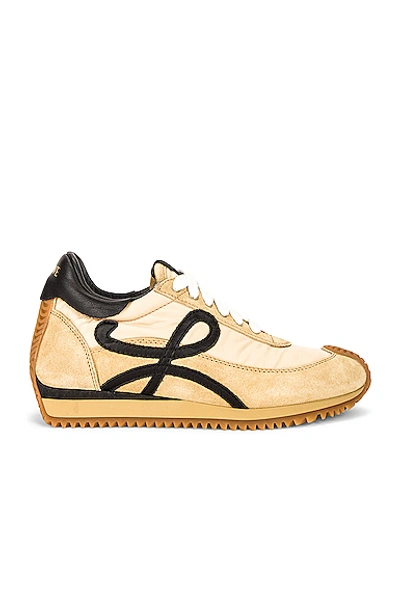 Shop Loewe Flow Runner Sneaker In Gold & Black