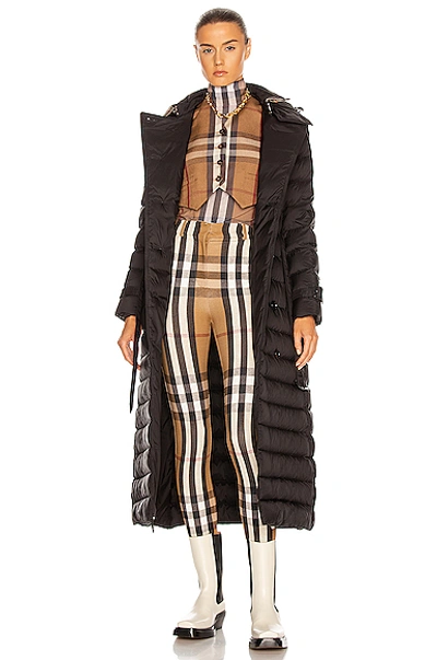 Shop Burberry Arniston Long Puff Jacket In Black