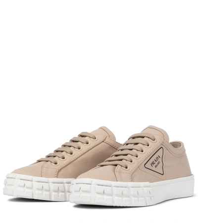 Shop Prada Wheel Canvas Sneakers In Beige