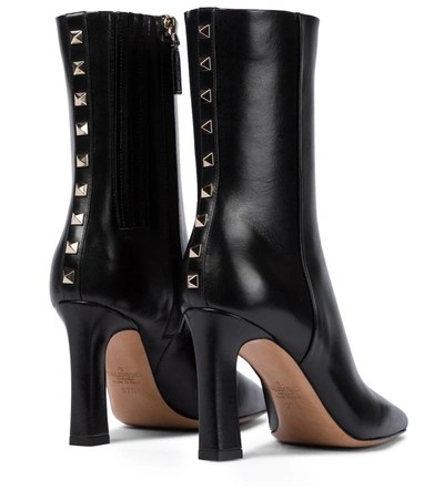 Shop Valentino Rockstud Leather Boots In Black
