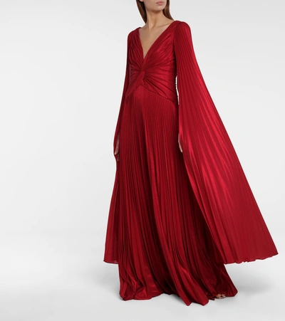 Shop Marchesa Notte Pleated Lamé Cape Gown In Red