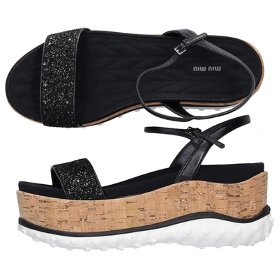 Shop Miu Miu Platform Sandals In Black