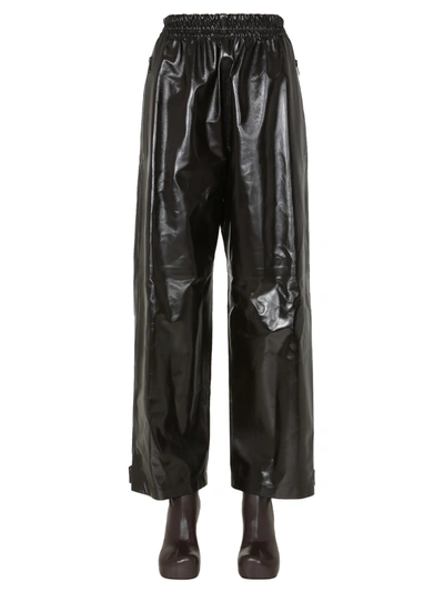 Shop Bottega Veneta Shiny Leather Pants In Marrone