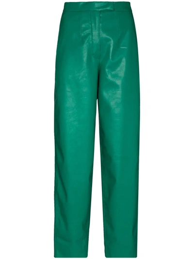 Shop Anouki Faux-leather Tapered Trousers In Green
