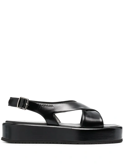 Shop Prada Debossed-logo Flat Sandals In Black