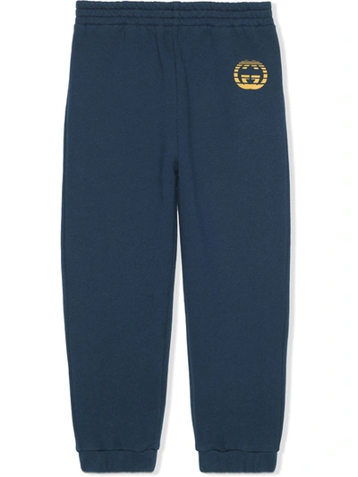 Shop Gucci Logo-print Cotton Track Pants In Blue
