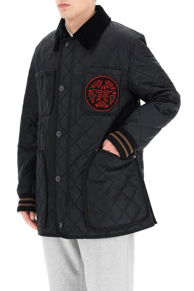 Shop Burberry Graphic Diamond Quilted Varsity Jacket In Black