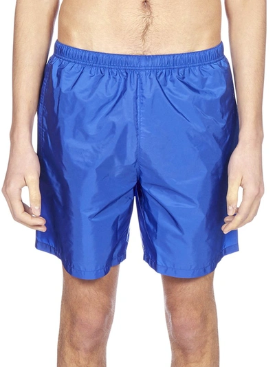 Shop Prada Elastic Waist Swim Shorts In Blue