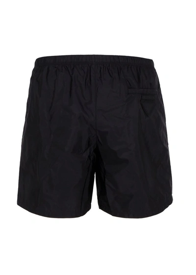Shop Prada Logo Patch Swim Shorts In Black