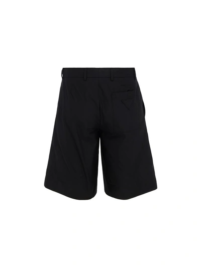 Shop Prada Logo Patch Bermuda Shorts In Black