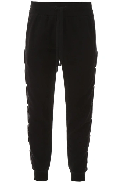 Shop Dolce & Gabbana Joggers With Embossed Logo In Nero