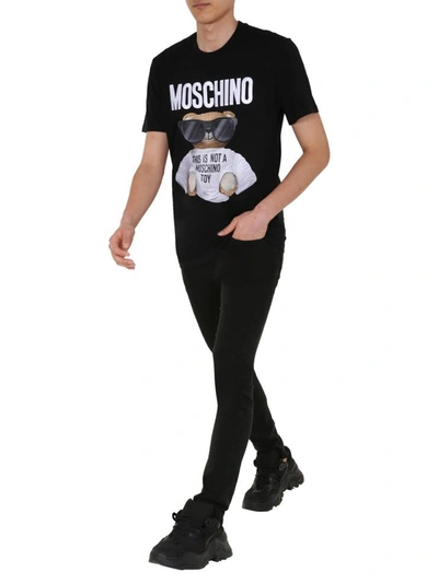 Shop Moschino Round Neck T-shirt In Black