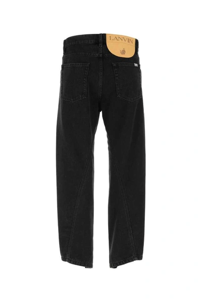 Shop Lanvin Asymmetric Hem Jeans In Black