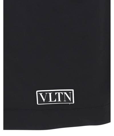 Shop Valentino "vltn" Tag Raincoat In Black  