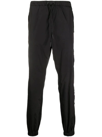 Shop Marcelo Burlon County Of Milan Marcelo Burlon Trousers In Nero