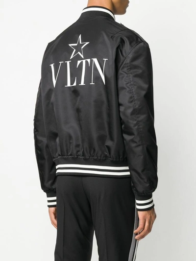 Shop Valentino Coats Black