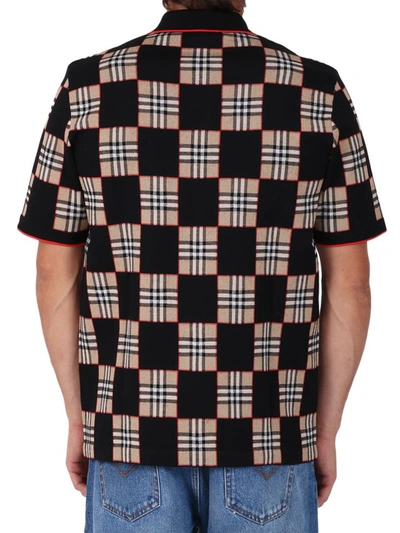 Shop Burberry Checkerboard Polo In Black