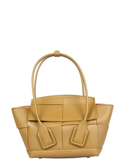 Shop Bottega Veneta Mini Arco Shoulder Bag In Yellow