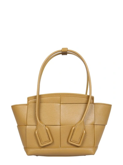 Shop Bottega Veneta Mini Arco Shoulder Bag In Yellow