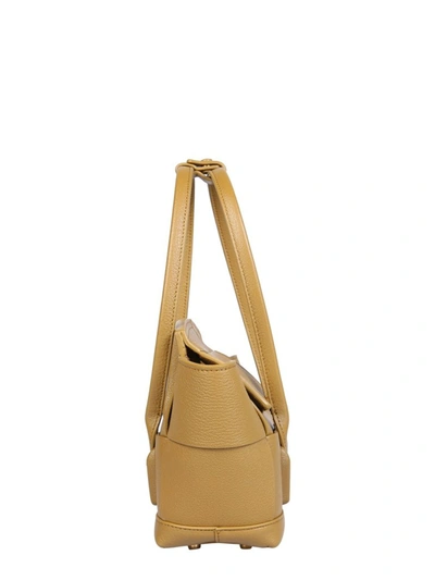 Shop Bottega Veneta Mini Arco Shoulder Bag In Yellow