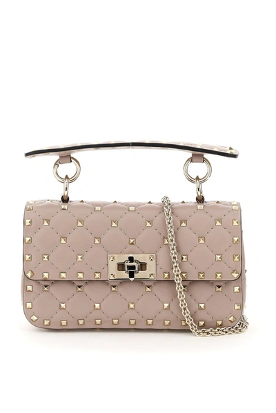 Shop Valentino Garavani Rockstud Spike Small Shoulder Bag In Pink