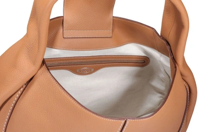 Shop Tod's Logo Embossed Hobo Bag In Brown