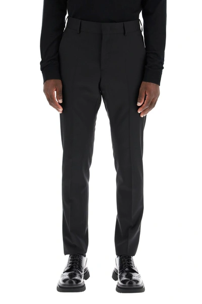 Shop Valentino Slim Fit Trousers In Nero