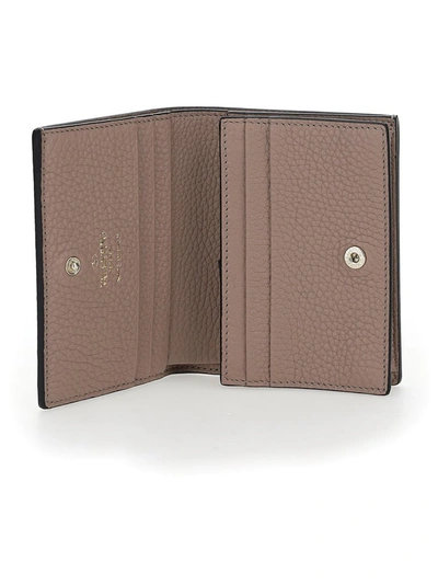 Shop Valentino Garavani Rockstud Small Compact Wallet In Pink