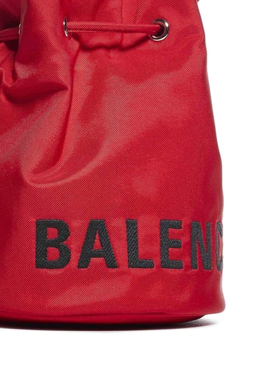 Shop Balenciaga Wheel Drawstring Xs Bucket Bag In Red