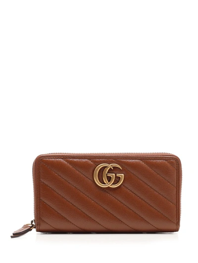 Shop Gucci Gg Marmont Matelassé Zip Around Wallet In Brown