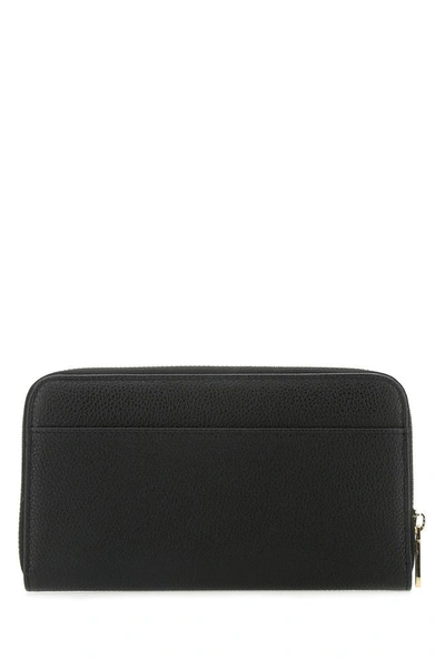 Shop Dolce & Gabbana Logo Plaque Zipped Wallet In Black