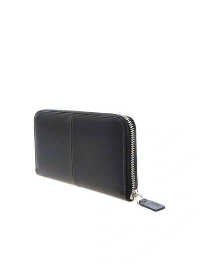 Shop Tod's Logo Zipped Wallet In Black