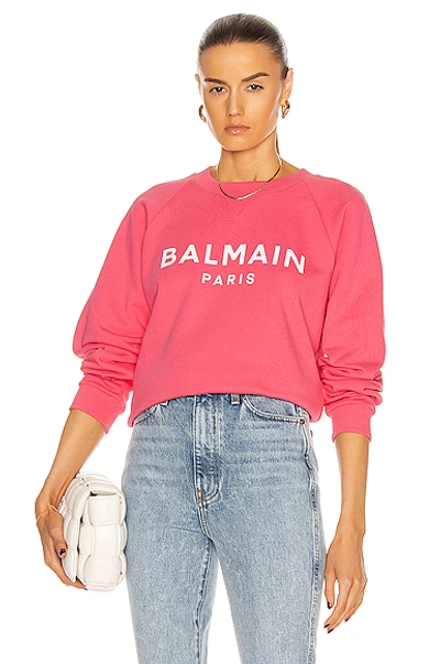 Shop Balmain Printed Logo Sweatshirt In Rose & Blanc