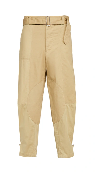 Shop Jw Anderson Tapered Trousers In Beige