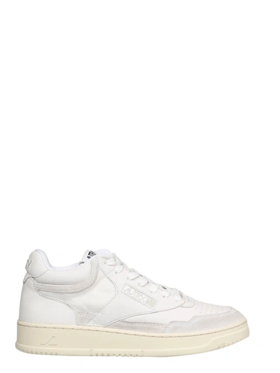 Shop Autry Capsule Mid Sneakers In White