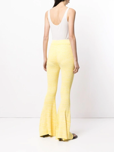 Shop Anna Quan Rib-knit Flared Trousers In Yellow