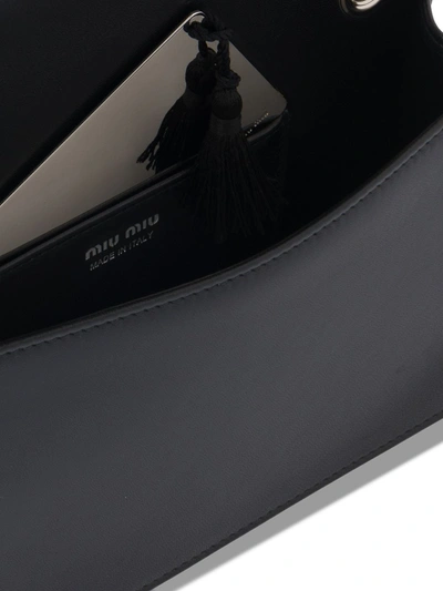 Shop Miu Miu Crystal-embellished Matelassé Leather Cross-body Bag In Black