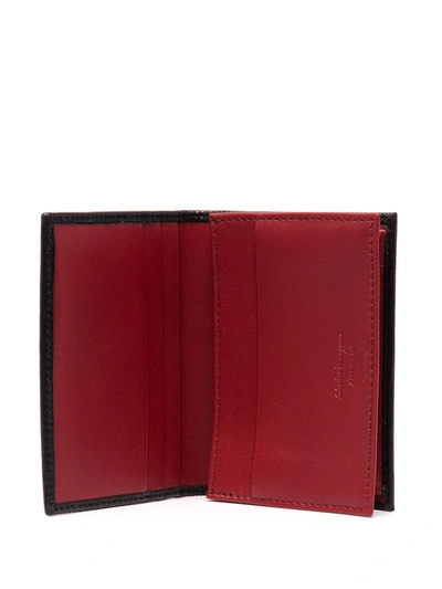 Shop Ferragamo Gancini Bifold Cardholder Wallet In Black