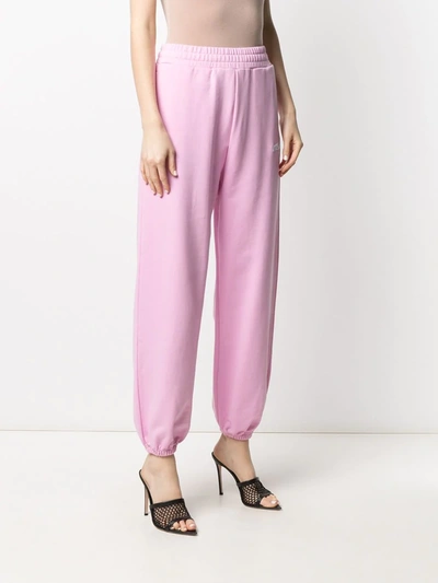 Shop Msgm Logo-embroidered Loose-fit Track Pants In Pink