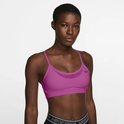 Shop Nike Indy Women's Light-support Striped Sports Bra (active Fuchsia) In Active Fuchsia,black