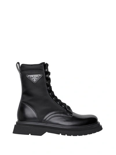 Prada Logo-plaque Panelled Ankle Boots In Black