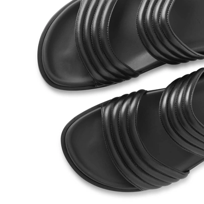 Shop Alaïa Black Leather Flat Sandals