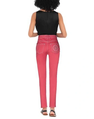 Shop Balmain Jeans In Coral