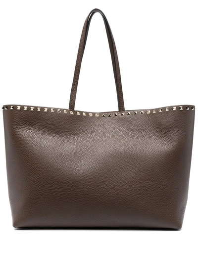 Shop Valentino Rockstud Trim Tote Bag In Brown