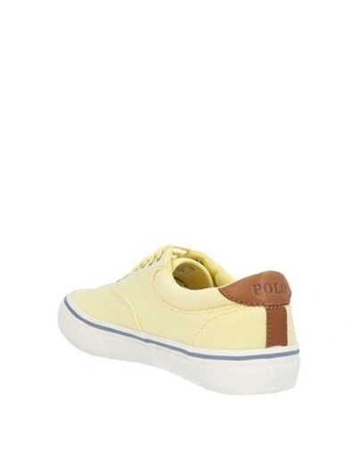 Shop Polo Ralph Lauren Sneakers In Light Yellow