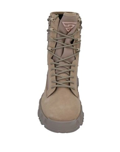 Shop Versace Ankle Boots In Beige