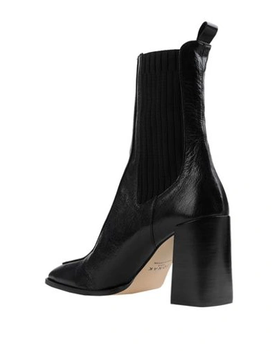 Jonak Ankle Boots In Black