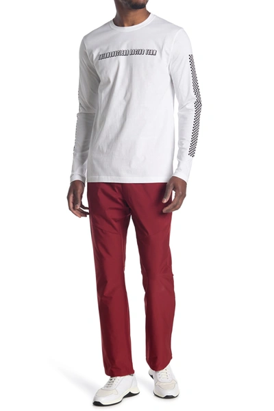 Shop Oakley Enhance 8.7 Wind Warm Pants In Iron Red